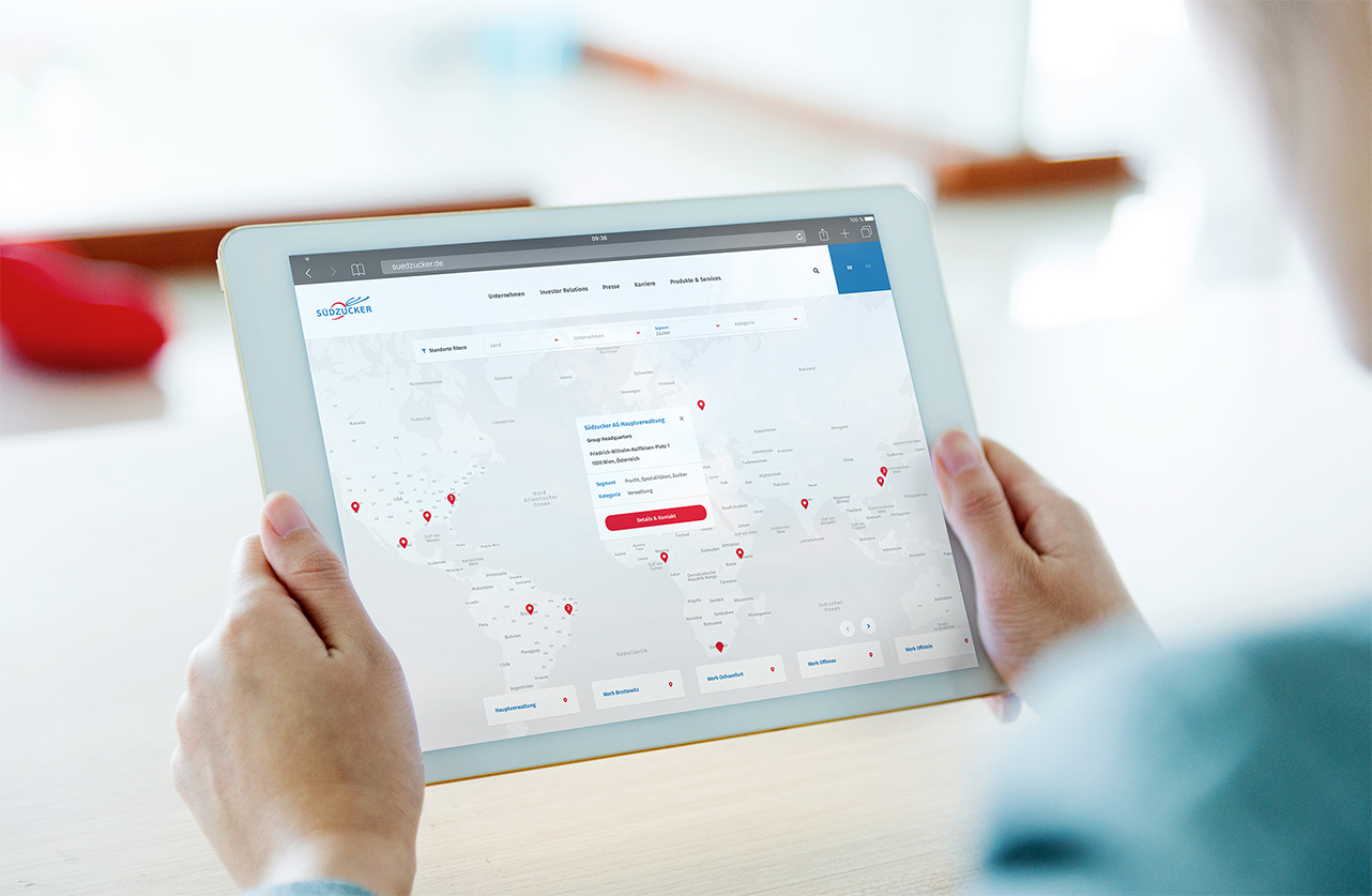 Woman looking at her tablet with the opend Südzucker Maps Page