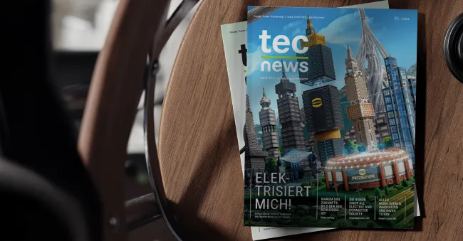 Eine Ausgabe der tec.news auf einem TIsch.