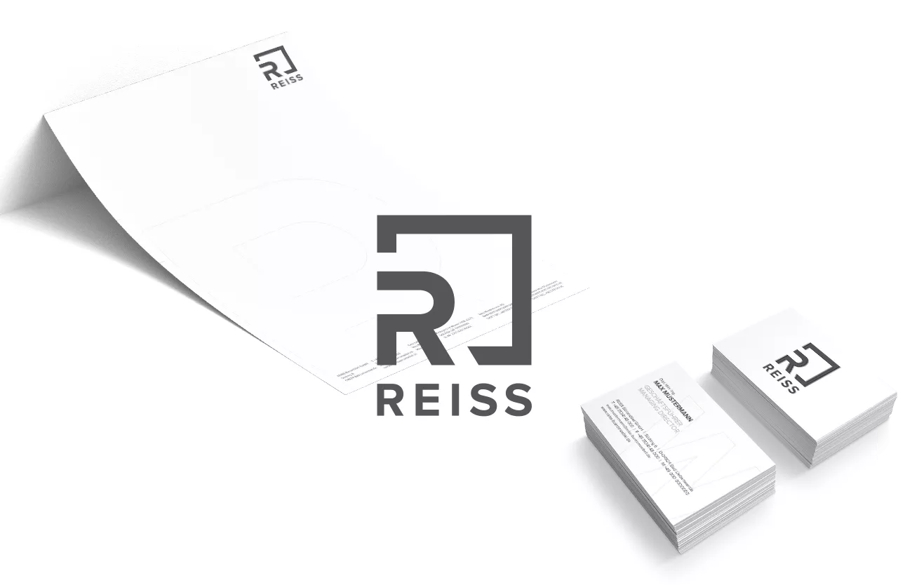 REISS Logo with business cards