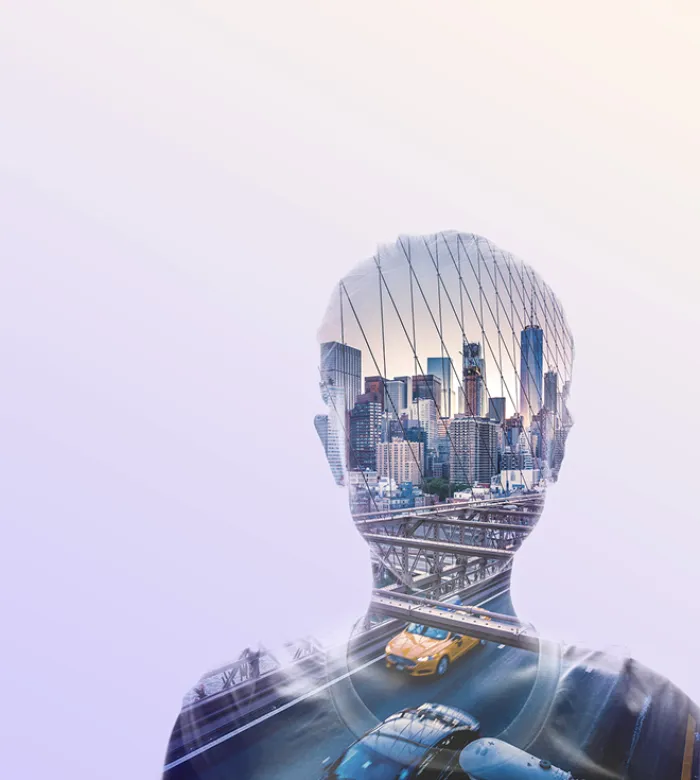 Eine Doppelbleichtung eines Frau und einer Großstadt