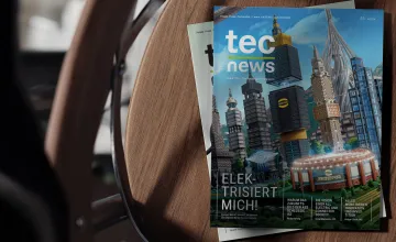 Eine Ausgabe der tec.news auf einem TIsch.