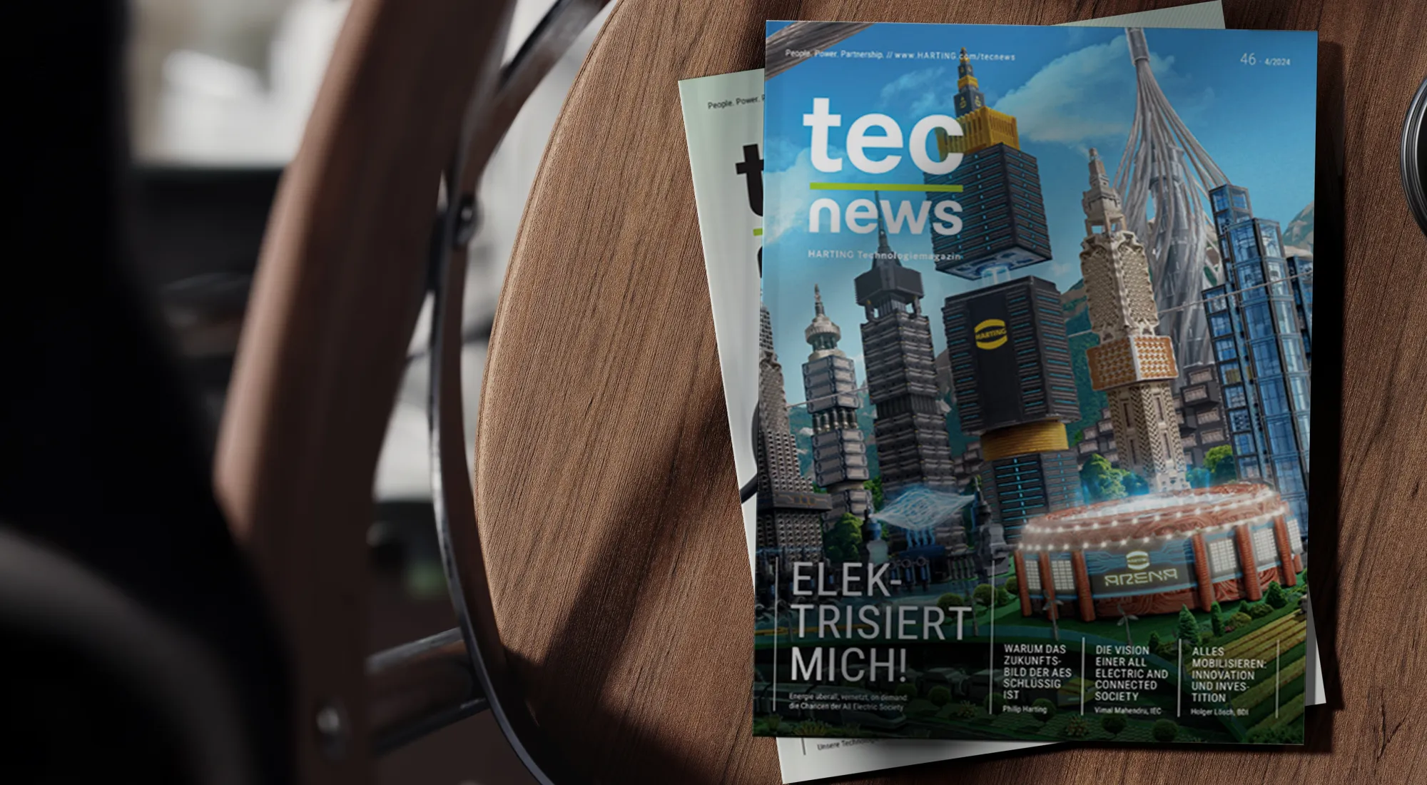 Eine Ausgabe der tec.news auf einem TIsch.